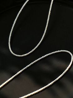 Accentuate your summer style with our chic Baby Pearl Strand Necklace, ideal for showcasing the neck with its delicate charm. This necklace features tiny, high-quality 2-3mm round baby pearls, carefully strung together to form a graceful 45cm length, complemented by a 3cm extension for adjustable fit. This versatile piece is perfect for any ensemble, promising easy elegance and a touch of sophistication for warmer days." Product Details: Pearl Type: Natural Freshwater Pearls Pearl Size: 2-3mm Ma Dainty Single Strand Akoya Pearl Necklace, Dainty Akoya Pearl Single Strand Necklace, Dainty Single Strand Pearl White Necklace, Dainty Single Strand Pearl Necklace In White, Minimalist Single Strand White Gold Pearl Necklace, Dainty Pearl White Single Strand Necklace, Minimalist White Gold Single Strand Pearl Necklace, Elegant Beaded Necklaces With Lobster Clasp For Everyday, Elegant Everyday Beaded Necklaces With Lobster Clasp