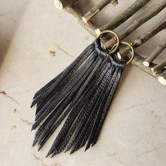 Black Fringe Dangle Earrings, Black Dangle Tassel Earrings For Festival, Black Fringe Dangle Jewelry, Black Dangle Jewelry With Fringe, Black Fringe Jewelry For Festival, Black Tassel Earrings For Festival, Black Tassel Jewelry For Festival, Festival Black Jewelry With Latkans, Black Jewelry With Latkans For Festivals