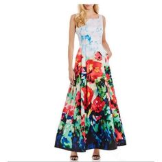 Nicole Miller Floral Gown In Floral Print. .Approx Length From Shoulder To Hemline 59" .Square Neckline, Scoop Back. . Sleeveless. . Voluminous Pleated Skirt. . Fit And Flare Silhouette. . Back Zip Closure. . Polyester. . Imported. Bust 36" Waist 32 " Thank You For Shopping My Closet. White A-line Summer Gown, Red Sleeveless Gown For Spring, Fitted White Floral Print Gown, White Sleeveless Spring Gown, White Floral Print Evening Gown, Sleeveless White Gown For Spring, Multicolor Maxi Length Gown For Spring, White Sleeveless Gown For Spring, White Floral Print Floor-length Gown