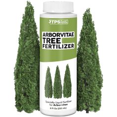 three trees are shown next to each other in front of an advertizer bottle