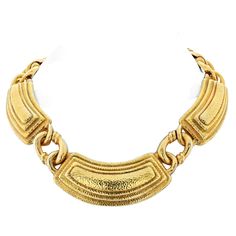 The David Webb 18K Yellow Gold Collar Ancient World Necklace is so wearable because it showcases a timeless design that can be easily incorporated into any outfit. The collar style provides a flattering fit for a range of necklines, while the intricate details and use of high-quality 18K gold make it a luxurious statement piece. Additionally, the necklace's versatility allows it to be dressed up or down, making it a great addition to any jewelry collection. Length: 16-17 inches. Grams: 150gr. Luxury Yellow Gold Statement Necklace, Big Gold Chains, 1970s Jewelry, 70s Jewelry, World Necklace, David Webb, Ancient World, The David, Gold Collar