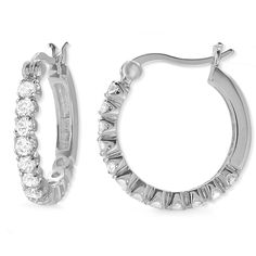 1.50cts. Cubic Zirconia Hoop Earrings in Sterling Silver with Anti-Tarnish Rhodium Finish or 18kt Gold Over Silver.  Latch Back Post Clasp. Approximate gram weight 4.10 grams of Sterling Silver.  Holds 24 Round 2.50mm Cubic Zirconias.  Equivalent to 1.50 carats in diamond weight.  Not only is this design Rhodium Plated giving you an Anti-Tarnish finish, but it is also covered under Orogem's Jose Jay Lifetime Limited Warranty for Service and Repairs. In business since 1980, count on us for your basic earring needs! -*Dimensions*- APPRX. LENGTH IN INCHES -  7/8   APPRX. WIDTH IN INCHES -  1/8 APPRX. LENGTH IN MM -  22 APPRX. WIDTH IN MM -  3 Silver Hoop Jewelry With Brilliant Cut, Cubic Zirconia Diamond Cut Hoop Earrings, Diamond Cut Cubic Zirconia Hoop Earrings, Cubic Zirconia Hoop Earrings With Diamond Cut, Sterling Silver Brilliant Cut Round Hoop Earrings, Sterling Silver Brilliant Cut Hoop Earrings, Round Cubic Zirconia Huggie Earrings With Diamond Cut, Classic Diamond Cut Cubic Zirconia Hoop Earrings, Cubic Zirconia Channel Set Hoop Earrings