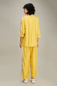 Yellow shirt with floral applique embroidery. Paired with chanderi pant. - Aza Fashions Designer Wear Sets With Embroidered Sleeves For Navratri, Navratri Straight Kurta Sets With Embroidered Sleeves, Festive Cotton Sets With Embroidered Sleeves, Embroidered Cotton Palazzo Set With Straight Pants, Festival Embroidered Straight Kurta Set, Designer Embroidered Cotton Pant Set, Festive Cotton Pant Set With Mirror Work, Straight Kurta Set With Embroidered Sleeves For Diwali, Designer Cotton Pant Set With Resham Embroidery