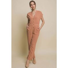 Get The Best Of Both Worlds With Our Comfy-Chic V-Neck Pocketed Jumpsuit. The Perfect Combination Of Style And Comfort, This Jumpsuit Has A Flattering V-Neckline And Functional Pockets For A Touch Of Practicality. Fabric Contents: 85% Rayon, 15% Linen **Color May Vary Slightly Due To Image And Screen Lighting** *In Stock Ships Approx. Within 8 Bus Days After Purchase From Ca** * If Purchased Through Website Ships Free And Faster Delivery Time* Spring Brown V-neck Jumpsuits And Rompers, Orange Fitted Chic Jumpsuits And Rompers, Chic Orange Fitted Jumpsuits And Rompers, Orange Jumpsuits And Rompers For Work, Brown V-neck Jumpsuits And Rompers For Spring, Fitted Orange Jumpsuits And Rompers For Work, Fitted Orange Jumpsuits For Work, Spring Brown V-neck Jumpsuit, Brown Jumpsuits