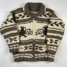 Vintage Hand Knit 100% Wool Cowichan Siwash Sweater Approx Sz: Small (No tag, please see measurements) Condition: Overall excellent pre-owned condition. Zips up and down perfectly. Light piling. Very thick, heavy weight knit. Smoke free home. Pet friendly home.  Approx Measurements Pit to Pit 21"  Collar to Bottom 24"  Pit to end of Sleeve 17" Vintage Long Sleeve Knitted Outerwear, Brown Knitted Winter Outerwear, Vintage Knitted Brown Outerwear, Vintage Knitted Winter Outerwear, Knitted Outerwear For Outdoor Fall, Rustic Brown Winter Outerwear, Casual Fair Isle Pattern Outerwear For Outdoor, Vintage Sweater For Outdoor Fall Wear, Vintage Fair Isle Pattern Outerwear For Fall