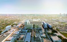 an aerial view of a city with tall buildings