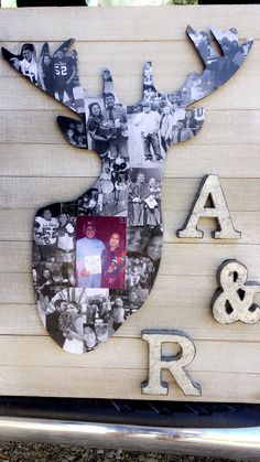 a wooden sign with photos and letters on it