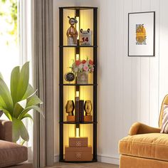 a living room filled with furniture and a tall glass display case next to a window