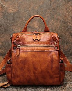 Overview： Design: Classic Leather Rucksack Womens Compact Leather Backpack Ladies Backpack PursesIn Stock: 3-5 Days To Process OrderInclude: A BagCustom: NoneMaterial: CowhideColor: Brown, Coffee, Red, Black GrayMeasures: 10 inches ( 28cm× 15cm× 26cm )Weight: 0.8kgSlots: 1 zip main slot, 1 inner slot, 1 zip inner slotStyle: Classic Leather Rucksack Womens Compact Leather Backpack Ladies Backpack PursesNote： Each item will have very slight variances to the pictured bag, and the consequence is tha Backpack Purses, Ladies Backpack, Handmade Backpack, Handmade Backpacks, Rucksack Bag, Leather Backpack Purse, Leather Backpacks, Nappy Bag, Leather Rucksack