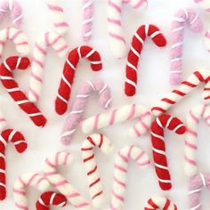 candy canes are arranged in the shape of letters