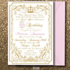 a pink and gold birthday party card with a tiara on the front, sitting next to a pink envelope