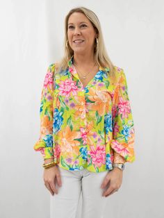 Embrace vibrant style with our Bright Floral Button Down Shirt, a versatile summer essential. Featuring a classic collar and long sleeves with cuffs, it offers multiple styling options—half-tucked, loose, or tied—for effortless chic. This statement piece can even be worn open over a tank top, adding flair to any ensemble. Flaunt your unique style with this versatile and eye-catching shirt. SIZE & FIT Fit is true to size Model is 5'6" wearing size small FABRIC 100% Polyester Vibrant Style, Flying Tomato, Floral Button Up, Summer Essential, Summer Concert, Shoe Boot Sandals, Effortless Chic, Summer Essentials, Summer Tops