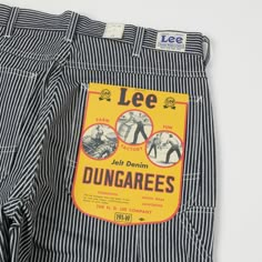 An incredible mid-century piece of workwear has been brought back to life, thanks to this incredible collection from Lee Archives! Cut from a 13.5oz ‘Hickory Stripe’ denim, this wide leg, high rise model would have originally been worn by rail road workers on the West Coast, with a shape which allowed for superb breathability, and a stripe which offered better visibility. A tool pocket can be found on the right thigh, while two large bell shaped pockets have been added to the back, conjuring a s Hickory Stripe Pants Outfit, Road Workers, Denim Flats, Flat Felled Seam, Rail Road, Fire Fits, Heritage Fashion, Straight Trousers, Streetwear Men Outfits