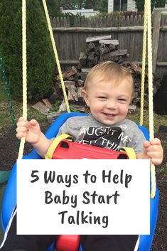 a baby sitting in a swing holding a sign that says 5 ways to help baby start talking