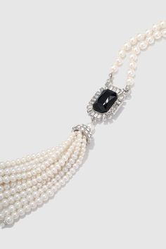 This sumptuous piece of jewelry features a retro-elegant yet slightly modern style that complements the lavish garments, reminiscent of the roaring 1920s. Features: Lustrous imitation pearls Delicate pearl tassels design Gorgeous gem studded High quality crystal rhinestones Glamorous Pearl Necklace For Evening, Glamorous Evening Pearl Necklace, Glamorous Pearl-embellished Evening Necklace, Glamorous Pearl Drop Necklace, Classic Beaded Pearl Necklace For Evening, Elegant Beaded Necklaces For Vintage Events, 1920 Accessories, Roaring 20s Jewelry, 20s Jewelry