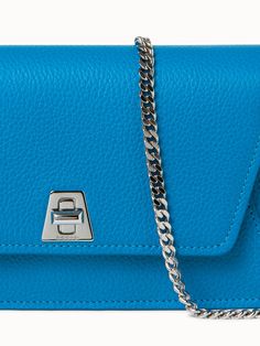 The unique color of this leather crossbody bag is still neutral enough to pair with most outfits. The versatile detachable crossbody chain easily adjusts to a shorter double top handle, allowing you to easily change up your look. Features interior zip, clamp, and six credit card compartments. Measures 19 x 11.5 x 4cm / 7.5 x 4.5 x 1.6in Modern Wallet On Chain With Detachable Strap, Modern Wallet On Chain With Removable Pouch, Leather Crossbody Wallet On Chain, Modern Wallet On Chain For Everyday Use, Everyday Wallet On Chain With Palladium Hardware, Modern Crossbody Wallet On Chain With Chain Strap, Modern Wallet On Chain With Detachable Strap For Evening, Modern Evening Wallet On Chain With Detachable Strap, Leather Wallet On Chain With Silver-tone Hardware