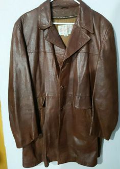 Elegante by Grais Men's Size 44 Jacket, Genuine Angelskin Leather, Brown, with Thinsulate, Zip-Out Vest Lining Very nice soft leather jacket.  Has zip-out lining, pockets.  Removable liner could be worn as lightweight spring or fall vest.  Top button is missing. Armpit to armpit is about 22" - 23" Length from top of collar to hem is about 37" Please note that orders are shipped at Noon ET each day.  Purchases made after that time will go out the next business day. We pride ourselves on customer Vintage Single-breasted Leather Outerwear, Vintage Leather Business Jacket, Vintage Leather Jacket For Business, Vintage Leather Outerwear For Business, Vintage Leather Business Outerwear, Vintage Leather Sport Coat For Fall, Vintage Leather Blazer For Business, Vintage Leather Single Breasted Sport Coat, Vintage Leather Sport Coat With Long Sleeves