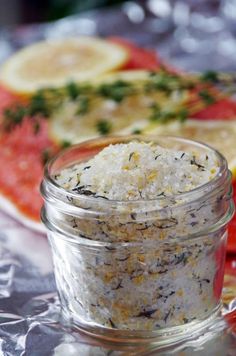 a glass jar filled with food sitting on top of a table