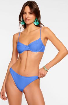 Feel supported on your next beach outing in this solid bikini top with an underwire and fully adjustable straps. Clasps at back Adjustable straps Lined 82% nylon, 18% spandex Hand wash, dry flat Imported Padded Underwire Swimwear For Beach Season, Summer Padded Underwire Swimwear, Summer Push-up Swimwear With Adjustable Straps, Beach Swimwear With Push-up And Adjustable Straps, Solid Nylon Swimwear With Padded Cups, Solid Color Nylon Swimwear With Padded Cups, Push-up Swimwear With Adjustable Straps For Beach, Nylon Swimwear With Padded Cups For Sunbathing, Padded Underwire Swimwear For Pool