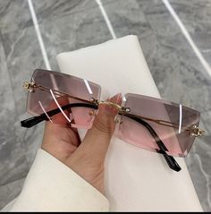 Be seen in a bold, new look with these Frameless Rectangle Shades. Stylishly rimless with UV400 lenses crafted from Polycarbonate, they will protect your eyes from the sun's harmful rays. Stylish and sophisticated, their 60mm x 52mm frame of lightweight alloy ensures a perfect fit while making a statement. So why not make your mark with these extraordinary sunglasses? Product Details Style: Rimless Lenses Optical Attribute: UV400 Lenses Material: Polycarbonate Lens Width: 60mm Lens Height: 52mm Cheap Casual Sunglasses With Gradient Lenses, Luxury Pink Formal Sunglasses, Trendy Cheap Sunglasses With Gradient Lenses, Cheap Gold Sunglasses With Gradient Lenses, Cheap Elegant Tinted Sunglasses, Luxury Rose Gold Tinted Sunglasses, Luxury Glamorous Sunglasses With Gradient Lenses, Modern Luxury Sunglasses With Tinted Lenses, Luxury Gradient Lens Sunglasses For Spring