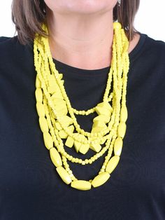 Our exclusive Lagenlook quirky wooden yellow strand necklace is a vibrant and eclectic accessory made of hand-painted wooden beads in various shapes, sizes, and colours. It features a long strand construction, adding a playful touch to any outfit. Lobster Claw closure with extension chain Wooden beads Length from neckline to bottom 11 inches (30 cm) approximately Yellow Multi-strand Beaded Necklace, Yellow Wooden Beaded Necklaces For Beach, Yellow Wooden Beads Necklace For Beach, Yellow Beach Necklaces With Wooden Beads, Yellow Necklaces With Wooden Beads For The Beach, Yellow Wooden Beads For Beach, Wood Bead Necklace, Necklace Long, Strand Necklace