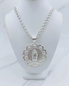 ✨ 925 Sterling Silver Sacred Jesus Pendant / Virgin Mary and necklace ✨ Double sided pendant Virgin Mary and Jesus  ✨ This medallion is approx 47mm or 1.85" ✨ Necklace chino link is 6.8mm and 26" long New jewelry Checkout my other items ✨ Dije de Plata 925 Medalla de Nuestra señora de Guadalupe y Sagrado Corazón  ✨ Doble cara ~ la Virgen María y Jesús  ✨ medalla mide 47 milímetros o 1.85 pulgadas ✨ Cadena mide 26 pulgadas y 6.8 milímetros Stock # 418695 P Stock #74064 Spiritual Silver Jewelry With Virgin Mary, Virgin Guadalupe, Virgin Mary Pendant Necklace As Gift, Silver Virgin Mary Pendant Jewelry, Spiritual Silver Necklace With Our Lady Of Guadalupe, Silver Our Lady Of Guadalupe Necklace, Silver Our Lady Of Guadalupe Pendant Jewelry, Spiritual Our Lady Of Guadalupe Pendant Necklace, Round Necklace