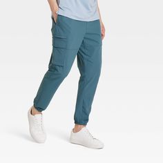 Why we're ALL IN: Solid-hued cargo jogger pants made from quick-dry fabric with moisture-wicking properties to help keep you cool and dry during a range of activities. Designed in a tapered-leg silhouette with elastic at the leg openings for a snug, stay-put fit. Side zipper pockets and side cargo pockets complete the look with functional flair. All in Motion™: Made for every move, priced for every day. Functional Joggers With Cargo Pockets For Outdoor, Functional Joggers With Cargo Pockets For Outdoor Activities, Stretch Nylon Cargo Pants With Moisture-wicking, Functional Moisture-wicking 4-way Stretch Cargo Pants, Sporty Midweight Cargo Pants With Side Pockets, Outdoor Joggers With Pockets, Stretch Joggers With Side Pockets For Outdoor, Sports Stretch Nylon Cargo Pants, Stretch Nylon Cargo Pants For Sports