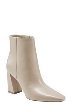 Boasting a clean-lined, sleek silhouette with a modern square toe and tapered block heel, this versatile leather bootie is a go-to cool-weather look. 3 1/2" heel(size 8.5) 4 3/4" shaft Leather upper/synthetic lining and sole Imported Modern Faux Leather Heeled Boots For Spring, Chic Square Toe Boots With Heel Tab, Chic Square Toe Boots With Branded Heel Counter, Modern Heeled Boots With Padded Heel For Spring, Chic Boots With Branded Heel Counter And Square Toe, Modern Padded Heel Boots For Spring, Modern Heeled Boots With Padded Ankle For Work, Chic Leather Boots With Branded Heel And Square Toe, Modern Faux Leather Heeled Boots With Block Heel