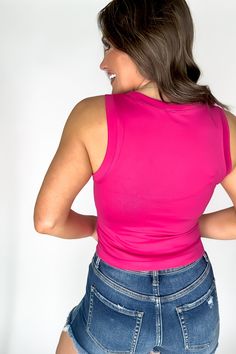 "Stay smooth and stretchy with the SR Basic Nina Fuchsia Flat Seamless Top. Perfect for any occasion, experience ultimate comfort and effortless style. No bumps or ridges for a sleek silhouette. Bye, bye bra lines!" Fit: She is wearing her true size medium. Fits true to size. If in between sizes, size down. High Stretch Seamless Pink Tank Top, Trendy Pink Seamless Tank Top, Trendy High Stretch Pink Tank Top, Stretch Pink Tops With Built-in Bra, Fitted Pink Tank Top With Seamless Construction, Pink Seamlessly Fitted Tank Top, Pink High Stretch Elastane Tops, Pink High Stretch Seamless Top, Pink Seamless Tank Top For Spring