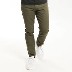 The perfect pair for a day or night out. These jeans are fun, colorful, and redefine "smart casual." Dress them up or down and wear these pants anywhere. Casual Tapered Leg Elastane Pants, Green Tapered Leg Chino Cotton Twill Bottoms, Green Chino Cotton Twill Bottoms For Work, Green Chino Cotton Twill Chinos For Work, Green Tapered Leg Chino Bottoms, Urban Stretch Pants With Five Pockets, Green Chinos For Workwear, Urban Stretch Cotton Jeans, Mid-rise Cotton Chinos For Everyday