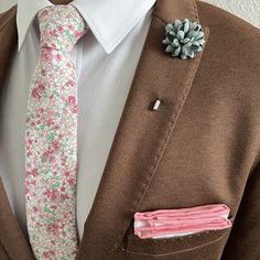 Handmade with 100% imported cotton fabric. Perfect for work, weddings or a night out on the town. This Floral Coral Pink Tie will make you feel like the gentleman you aspire to be or accentuate the gentleman you already are. You’ll look good, feel good and do good things in this tie. Makes the perfect gift for a fellow gentleman or for that man in your life by making them look good and feel good. We guarantee your satisfaction with our free refund policy.* Goes Good With: Beige, Tan, Navy, Grey, Earth Tone Wedding, Coral Tie, Flower Lapel Pin, The Gentleman, Bow Tie Set, Pink Ties, Navy Grey, Look Good Feel Good, Pink Tie