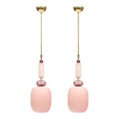 pair of pink glass and gold earrings