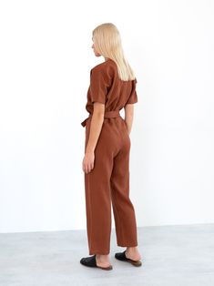 "AURORA is a short sleeve jumpsuit with belt. DETAILS - Wrap style top - Dolman sleeves - Self tie belt - 100% lightweight European linen fabric - Cut and sewn to order just for you in our studio COLOR - Rust, you can also choose other colors above - Fabric samples are available here https://www.etsy.com/listing/586569696/linen-fabric-samples SIZING & FIT - Fits true to size - Inseam is approximately 28.5 inches / 72 cm - Bust is approximately 21 inches / 49.5 cm - Waist is approximately 18. Chic Belted Short Sleeve Jumpsuits And Rompers, Summer Workwear Jumpsuits And Rompers With Belt, Summer Workwear Belted Jumpsuits And Rompers, Chic Belted Jumpsuits And Rompers With Short Sleeves, Chic Belted Short Sleeve Jumpsuit, Chic Belted Jumpsuit With Short Sleeves, Summer Workwear Jumpsuits With Short Sleeves, Brown Short Sleeve Jumpsuits For Work, Fitted Short Sleeve Jumpsuits And Rompers With Tie Waist