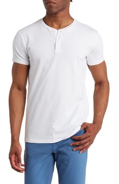 A classic henley crafted from cotton with a touch of stretch delivers everyday style and comfort. 27" length (size Medium) Button half-placket 95% cotton, 5% spandex Short sleeves Machine wash cold Imported Model stats: 6'1" height, 32" waist. Model is wearing size Medium. Henley Neckline T-shirt With Button Closure And Relaxed Fit, White Cotton T-shirt With Henley Neckline, Relaxed Fit Cotton T-shirt With Button Closure, Fitted Cotton T-shirt With Button Closure, Casual Stretch T-shirt With Button Closure, Stretch Cotton Tops With Henley Neckline, Classic Henley With Button Closure, Stretch Cotton Polo Shirt For Summer, Summer Henley T-shirt With Button Closure