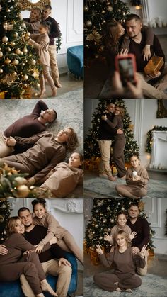 the family is posing for pictures in front of their christmas tree