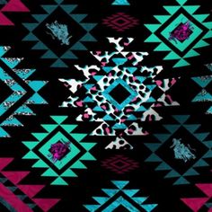 a black background with blue, pink and green designs on it's edges is shown