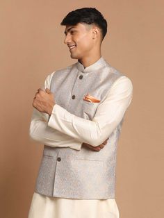 VASTRAMAY Men's Grey Silk Blend Woven Nehru Jacket A sophisticated take on the classic Nehru jacket, this VASTRAMAY piece is crafted from a luxurious silk blend fabric for a touch of elegance. Key Features: Material: Silk Blend Color: Grey Style: Nehru Jacket Woven design Button closure Multiple pockets Specifications: Brand: VASTRAMAY Size Options: S, M, L, XL, XXL Fit: Regular Occasion: Casual, Festive, Party Care Instructions: Dry clean only Material & Care: The jacket is made of a luxurious Traditional Silk Outerwear For Formal Occasions, Traditional Silk Formal Outerwear, Classic Nehru Jacket For Groom, Classic Long Sleeve Nehru Jacket For Festive Occasion, Luxury Nehru Jacket With Stand Collar, Silk Long Sleeve Nehru Jacket, Classic Nehru Jacket With Stand Collar For Festive Occasions, Classic Nehru Jacket For Festive Semi-formal Occasions, Festive Classic Nehru Jacket With Stand Collar