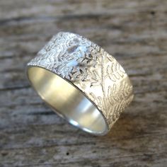 "This delicate fern ring is fully handmade of solid sterling silver. Each ring is a bit different and completely unique. Sterling silver ring is made to your size. The pattern can be darkened for a more vintage, weathered look. This offer is for 1 cm wide ring (width can be made to order, just send me a message and I'll create a special listing for you). Your custom made ring will be prepared and shipped in 7 business days. SIZE: Ring width: 1 cm MATERIAL: Sterling silver PLEASE NOTE: Every piec Handmade Silver Engraved Ring, Nature-inspired, Handmade Nature-inspired Silver Engraved Ring, Nature-inspired Silver Rings With Natural Inclusions, Fern Ring, Witchcraft Jewelry, Botanical Ring, Silver Fern, Artisan Rings, Witchy Jewelry