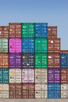 a large stack of containers stacked on top of each other