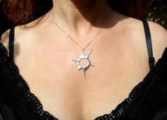 "The mysteries of our solar system always get our imagination aroused. Watching a solar eclipse gives us this feeling of us being part of a great universe. When the moon blocks the sun it is a rare, fascinating, magical moment. I love to carry this moment around with me ----Details---- A solar eclipse pendant from solid sterling silver hand carved using the lost wax method. hole diameter: 11mm 0,43inch comes on a 18 inch/ 45cm long black sterling silver chain.If you would like a 20 inch / 50cm l Sterling Silver Sun Design Jewelry, Unique Sterling Silver Sun And Moon Jewelry, Sterling Silver Jewelry With Sun Design, Eclipse Jewelry, Eclipse Necklace, Eclipse 2024, Anniversary Necklace, Necklace Star, Diy Jewelry Inspiration