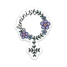 a sticker with the word autumn written on it and flowers in front of it