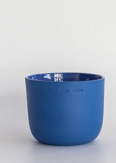 a blue bowl with the words, this is your king on it's side