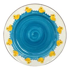 a blue and white plate with yellow rubber ducks on it