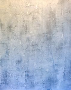 an abstract blue and white background with rough edges