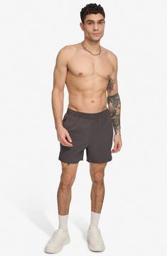 Hit the beach or kick it on the boardwalk in these quick-drying swim trunks built with UPF 40+ sun protection. 5" inseam (size Medium) Elastic waist On-seam slant pockets Lined UPF 40+ sun protection 94% polyester, 6% spandex Machine wash, line dry Imported Gray Activewear With Built-in Shorts For Summer, Sporty Relaxed Fit Athletic Shorts For Swimming, Beachwear Nylon Swim Trunks For Workout, Relaxed Fit Functional Swim Trunks For Beach, Functional Relaxed Fit Swim Trunks For Beach, Functional Beach Swim Trunks Relaxed Fit, Beachwear Style Workout Swim Trunks, Upf 50+ Swim Trunks For Beach Season Sports, Upf 50+ Swim Trunks For Beach Sports