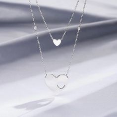 Brand New Rachel Roy Sterling Silver Dual Necklace With 18- And 16-Inch Chains With Hearts. Gift Box Included. Silver Heart-shaped Layered Necklace Gift, Silver Heart-shaped Layered Necklace For Gifts, Silver Heart-shaped Layered Necklace As A Gift, Silver Layered Heart Necklace For Gifts, Silver Layered Necklace With Delicate Chain For Gift, Silver Layered Clavicle Chain Necklace As Gift, Gift Silver Layered Necklace With Double Chain, Silver Heart Shaped Double Chain Jewelry, Heart Pendant Necklace With Double Chain For Gift