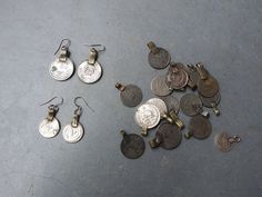 Hypoallergenic Stainless Steel ear hooks. Each pair is unique.  Made with vintage pieces.  Sizes of coins vary.  The earrings in each pair will be similar but not identical in size, shape, and coloring. Africa Earrings, Oxidized Silver Earrings, Round Dangle Earrings, Antique Coins, Faux Pearl Earrings, Coin Earrings, Tiny Earrings, Delicate Earrings, Delicate Rings