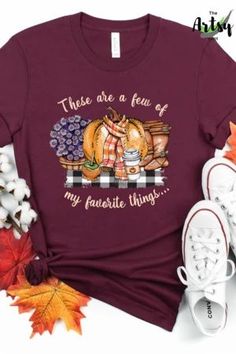 These are a few of my favorite things shirt, I love fall shirt, adorable fall shirt, cute fall t-shirt, cute shirt for fall, shirt with buffalo plaid, This trendy fall design is a perfect way to show your love of fall, pumpkin spice, mums, boots, buffalo plaid, fall treats, scarves and pumpkins. This fall shirt would be great with your fall wardrobe. Pair this fall t-shirt with a pair of jeans, boots and a jacket or cardigan and you'll be stylin' for the fall season. Fall Tee Shirts, Fall Shirts Women, Fall T Shirt, Jeans Boots, Fall Tee, Fall Treats, Fall Shirt, Trendy Fall, Fall Design