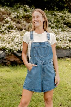 A classic piece for your summer wardrobe. The Portland Shortalls are lightweight making them breathable for warmer days. They feature adjustable straps and cuffs that can unroll for extra versatility.  XS: 28" Waist / 44" Hips / 3" Inseam (4.5" unrolled) S: 30” Waist / 46” Hips / 3” Inseam (4.5” unrolled) M: 32” Waist Relaxed Fit Overalls For A Day Out, Summer Utility Jumpsuits And Rompers, Summer Cotton Shortalls With Relaxed Fit, Spring Casual Jumpsuits And Rompers With Adjustable Straps, Casual Jumpsuits And Rompers With Adjustable Straps For Spring, Casual Jumpsuits And Rompers With Suspenders For Spring, Medium Wash Shortalls With Adjustable Straps, Casual Spring Jumpsuits And Rompers With Adjustable Straps, Relaxed Fit Denim Jumpsuit Overall For Day Out