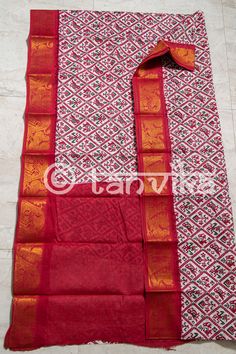 Here's a unique Madurai Sungudi Saree featuring Patola inspired prints all over the body and contrast border with peacock patterns in zari. Border Zari patterns will be exactly same as in pictures. Simple, sober, earthy, these sarees are light weight, pure cotton, airy, versatile, comfortable to drape and wear, colorful. The print might have slight irregularities in the pattern & colors and the edges may not be perfectly straight which results from the human involvement in the dip dyeing pro Red Chanderi Block Print Sets, White Salwar Kameez With Kalamkari Print For Navratri, White Cotton Silk Dupatta With Block Print, White Kalamkari Print Sets For Festivals, White Chanderi Sets With Printed Border, White Bollywood Salwar Kameez With Printed Border, Transitional Cotton Silk Dupatta With Block Print, Cotton Silk Sets With Kalamkari Print For Puja, White Block Print Traditional Wear For Puja